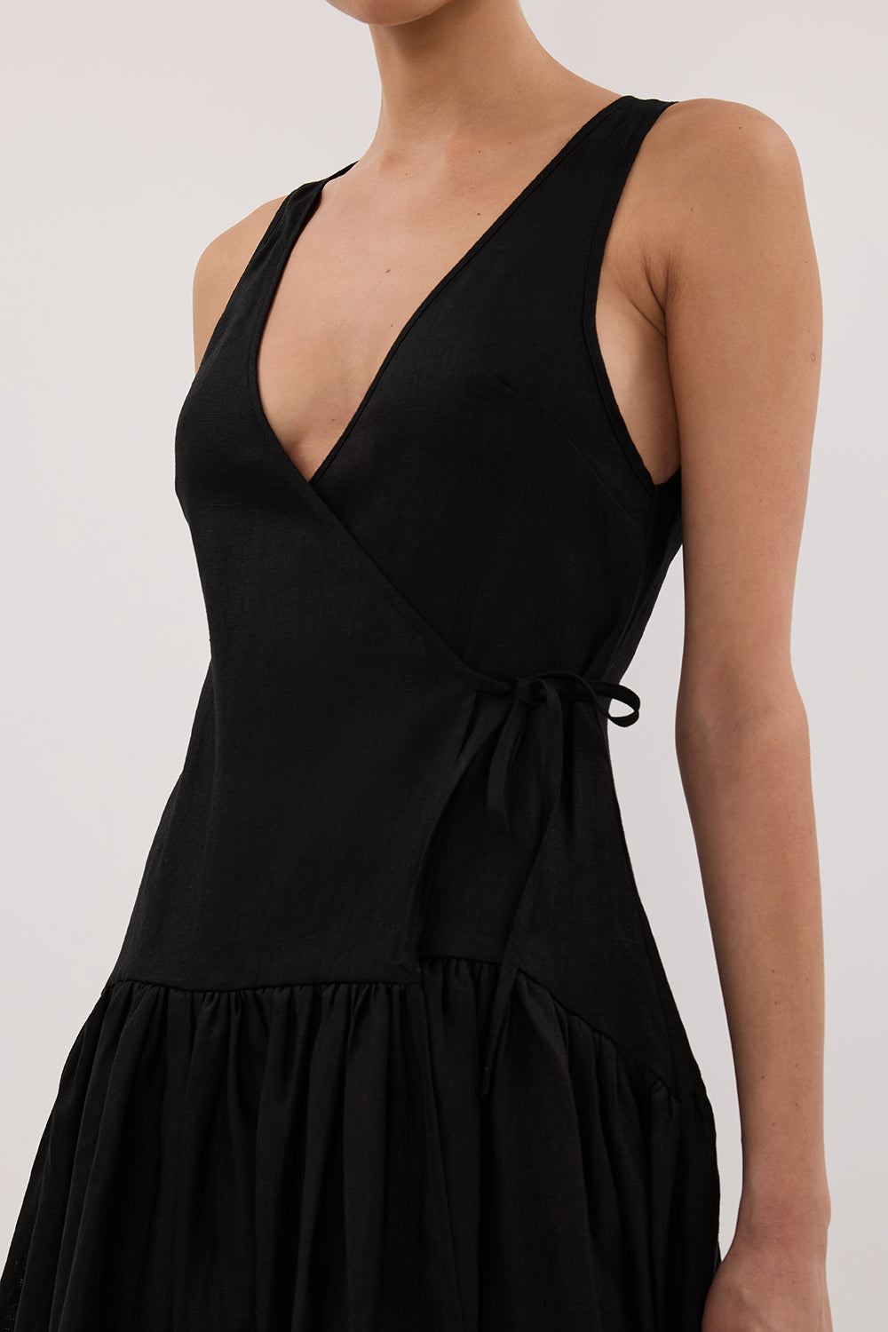 Ilio Sleeveless Linen Wrap Midi Dress in Black By DISSH