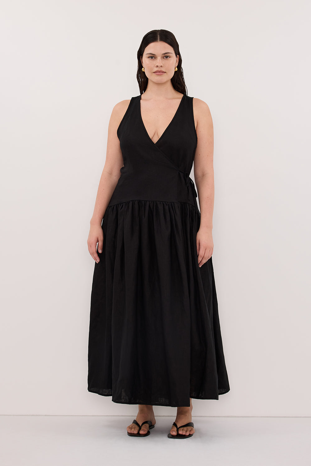 Ilio Sleeveless Linen Wrap Midi Dress in Black By DISSH Ilio Sleeveless Linen Wrap Midi Dress in Black By DISSH