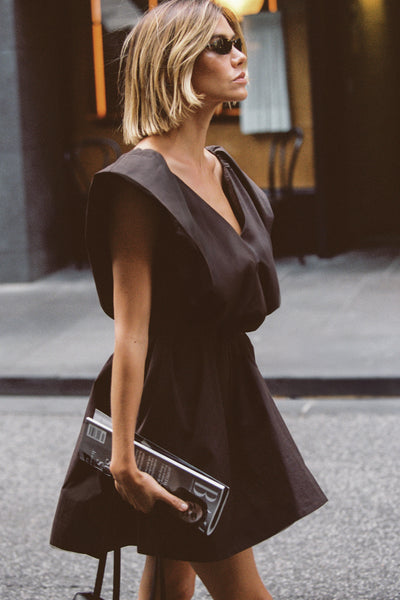Joanna wearing SABRE BURNT CHOC COTTON MINI DRESS