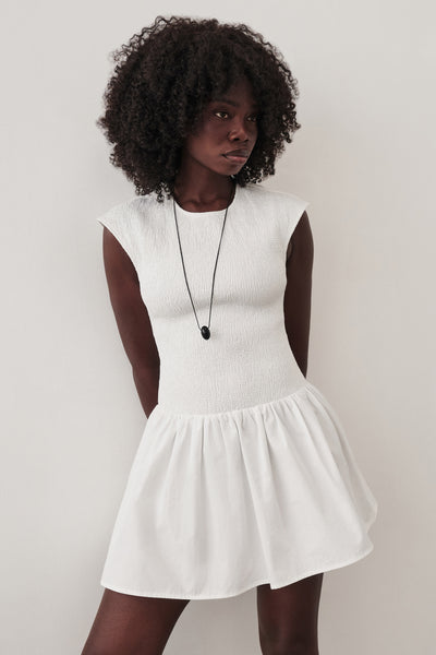 Cynthia wearing RUBI WHITE COTTON MINI DRESS