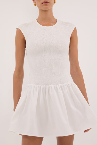 Cynthia wearing RUBI WHITE COTTON MINI DRESS