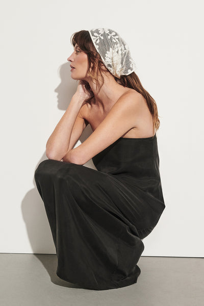Montana wearing EDITH BLACK CUPRO STRAPLESS COCOON DRESS