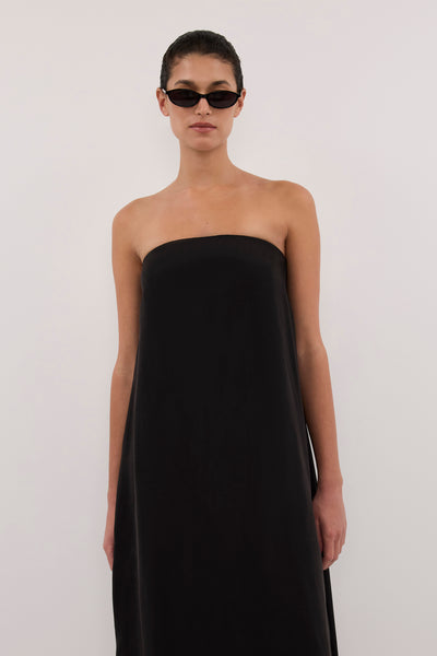 Aude wearing EDITH BLACK CUPRO STRAPLESS COCOON DRESS