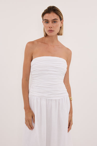 Joanna wearing AUBRIELLA WHITE LINEN MIDI DRESS