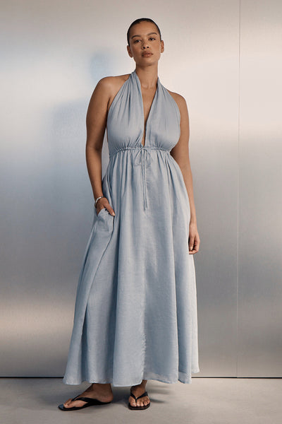 Shimma wearing SAMMI DUSTY BLUE RAMIE MIDI DRESS