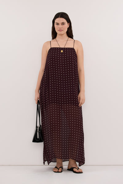 Jasmine wearing VANESSA BITTER CHOC SLEEVELESS MIDI DRESS
