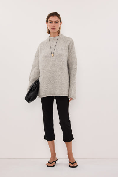 Joanna wearing MILLY SILVER CREW NECK KNIT JUMPER