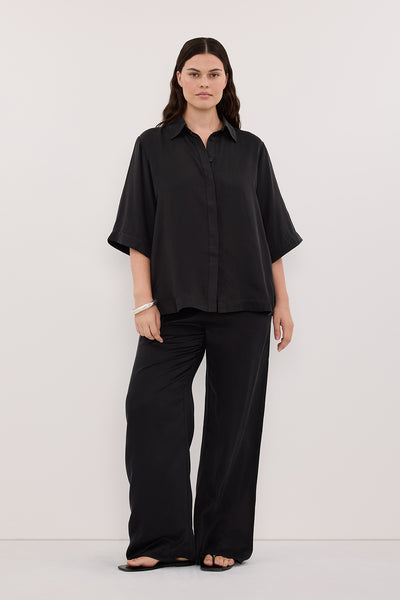 Jasmine wearing PERCY BLACK SILK SHIRT