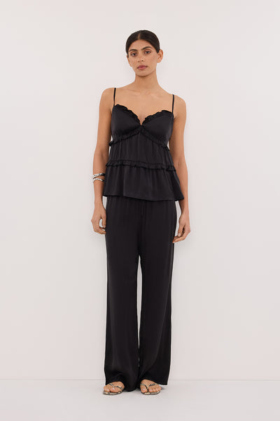Annie wearing LENA BLACK SILK SLEEVELESS FRILL TOP