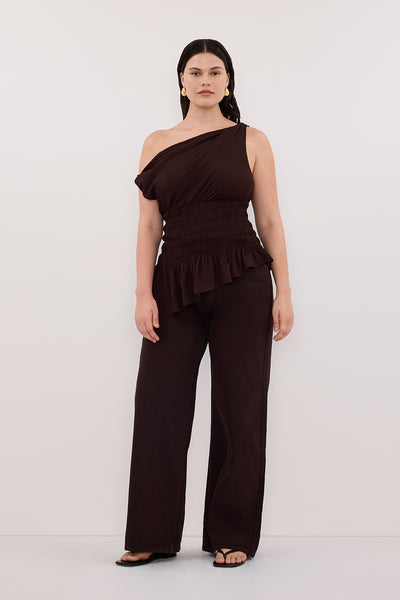 Jasmine wearing TIANA DARK CHOC ASYM TOP