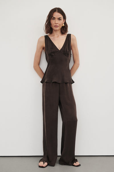 Bambi wearing JORJA BITTER CHOC SLEEVELESS SILK TOP
