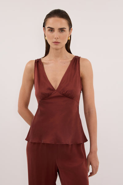 Stas wearing JORJA SAHARA SLEEVELESS SILK TOP
