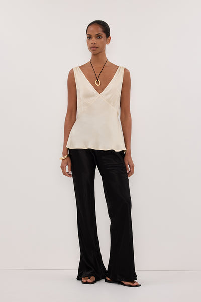 Kristen wearing JORJA STRAW SLEEVELESS SILK TOP