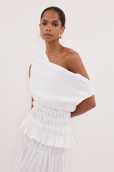 Kristen wearing MAIA WHITE SLEEVELESS LINEN SHIRRED TOP