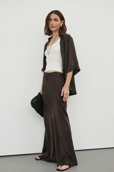 Annie wearing COLETTE BITTER CHOC SILK MAXI SKIRT