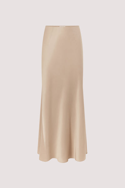 Kristen wearing JULIETTE GOLD SILK MIDI SKIRT