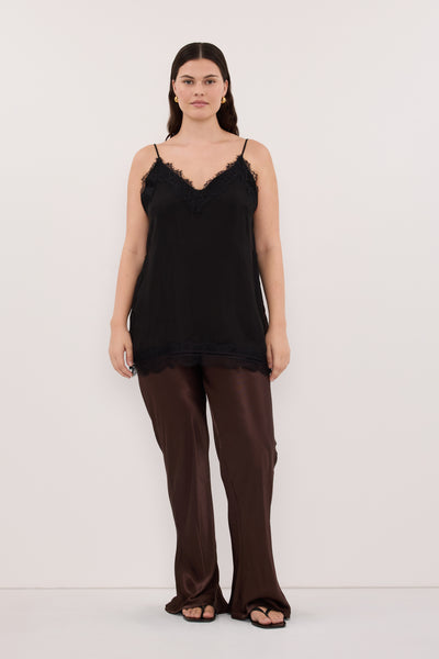 Jasmine wearing NIKKI BITTER CHOC SATIN BIAS PANT