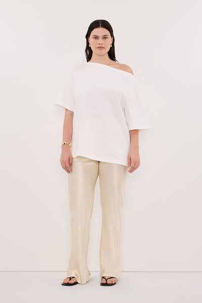 Jasmine wearing NIKKI CREAM SATIN BIAS PANT