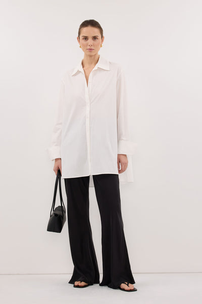Stas wearing MELANI BLACK SILK BIAS PANT