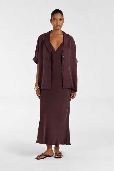 Eduarda wearing LIAM CURRANT CUPRO SLIP MIDI DRESS