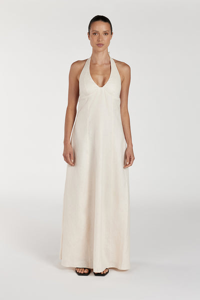 Casey wearing AUDREY CREAM HALTER LINEN MIDI DRESS