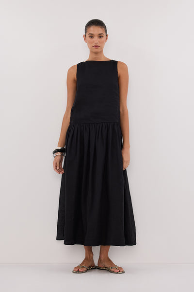 Aude wearing JACQUES BLACK RAMIE MIDI DRESS