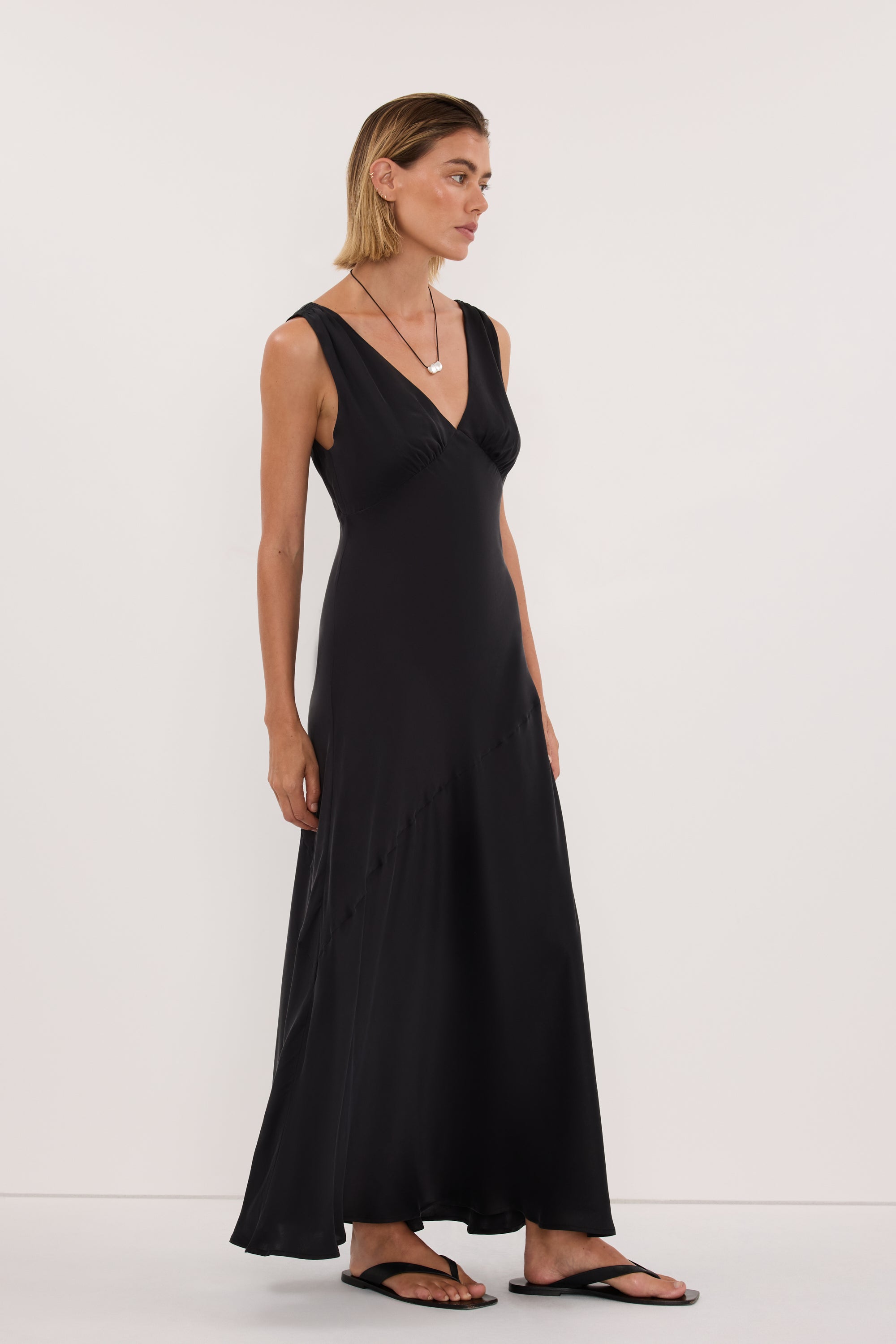 Mila Silk Sleeveless Midi Dress in Black By DISSH Mila Silk Sleeveless Midi Dress in Black By DISSH
