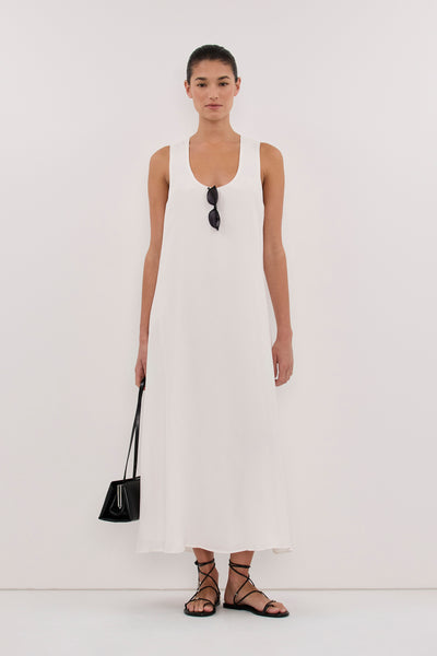 Aude wearing PALORA WHITE CUPRO SCOOP MIDI DRESS