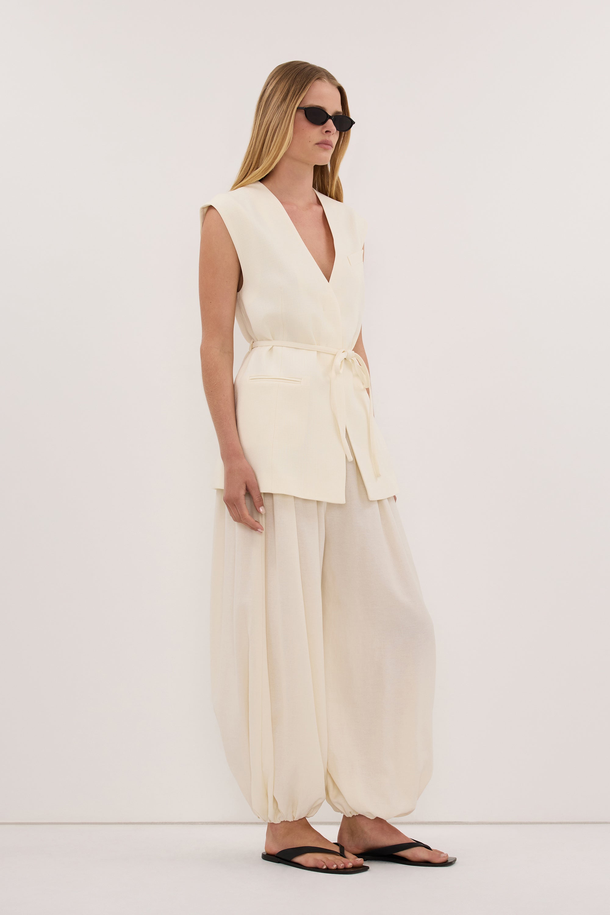 EMORY CREAM COLLARLESS PEPLUM VEST