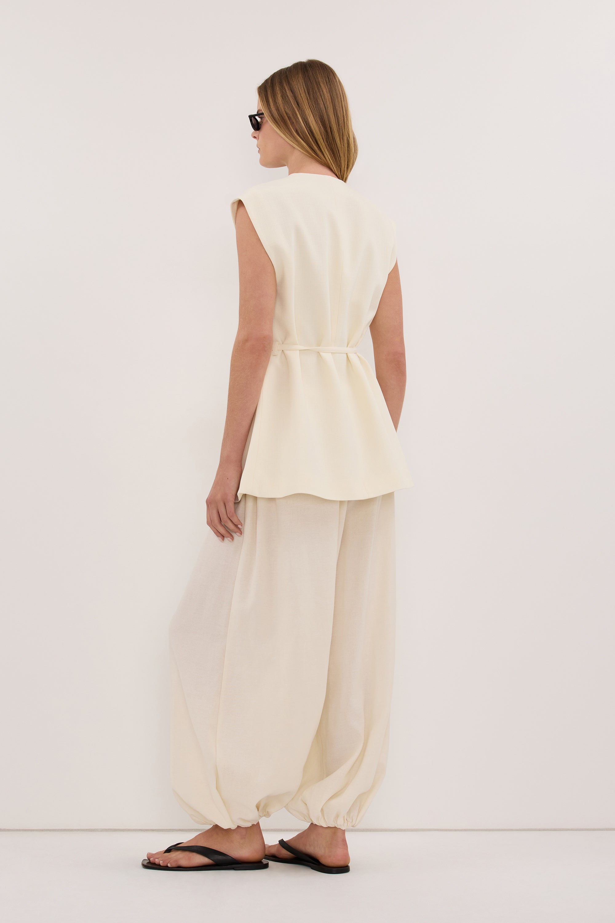 EMORY CREAM COLLARLESS PEPLUM VEST