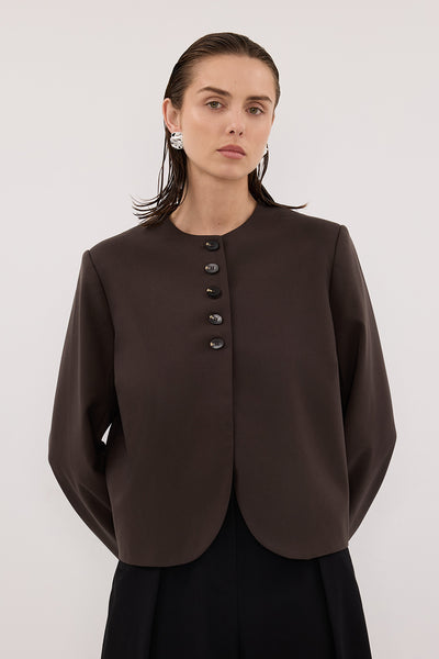 Casey wearing RYAN BITTER CHOC OVERSIZED CROPPED BLAZER