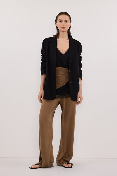 Stas wearing LIZA BLACK OVERSIZED BLAZER