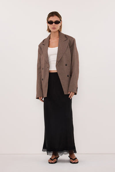 Joanna wearing HAILEY CHOC OVERSIZED STRIPE TIE BLAZER