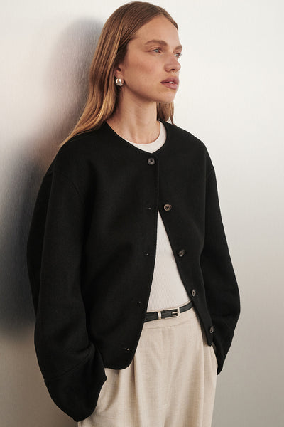 Zoe wearing JACLYN BLACK CROPPED COAT