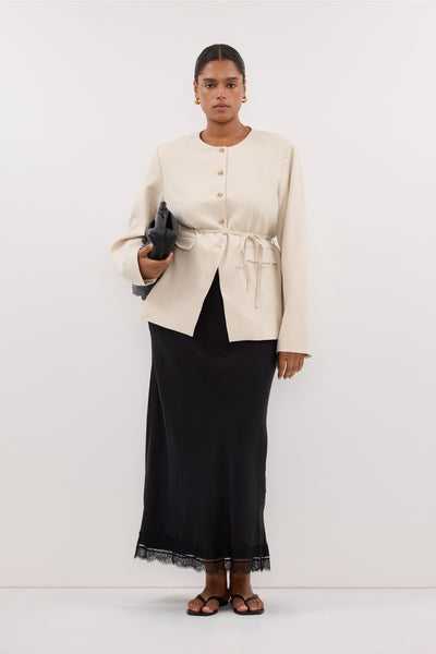 Amanda wearing CYRUS BONE COLLARLESS BLAZER