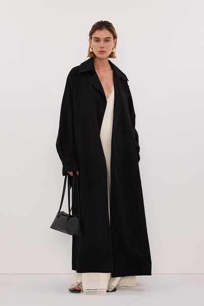 Joanna wearing NINA BLACK LIGHTWEIGHT TRENCH COAT