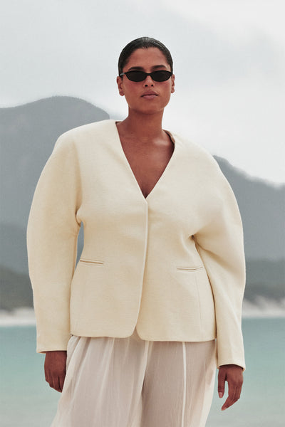 Amanda wearing BOBBI CREAM BOUCLE COCOON BLAZER