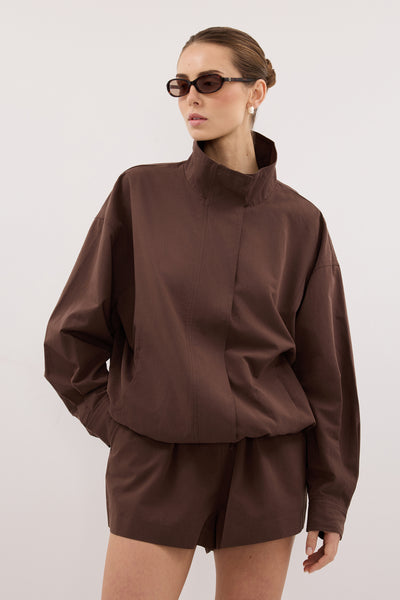 Stas wearing RORY MILK CHOC LIGHTWEIGHT TRACK JACKET