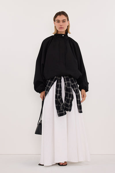 Joanna wearing OAKLEE BLACK BATWING LIGHTWEIGHT JACKET