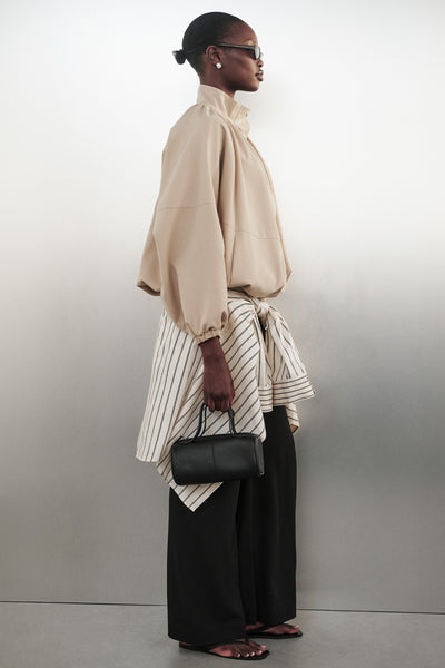 Ayen wearing OAKLEE STONE BATWING LIGHTWEIGHT JACKET