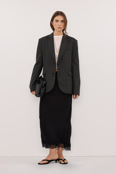 Stas wearing SOFIA DARK GREY OVERSIZED TEXTURED BLAZER