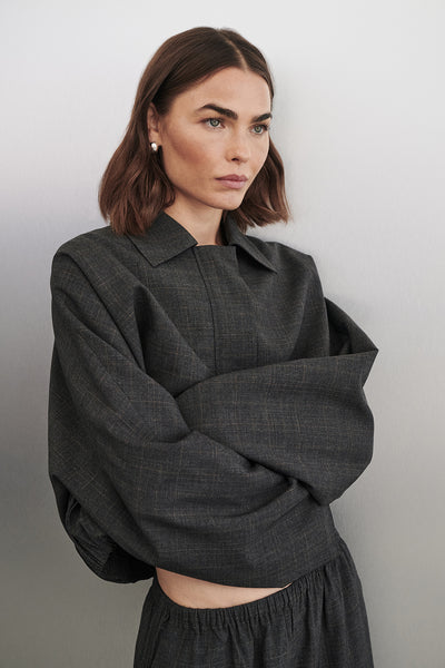 Bambi wearing MARCO GREY PLAID BOMBER JACKET