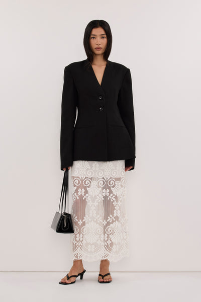 Zoey wearing ROSALIE BLACK CINCHED BLAZER
