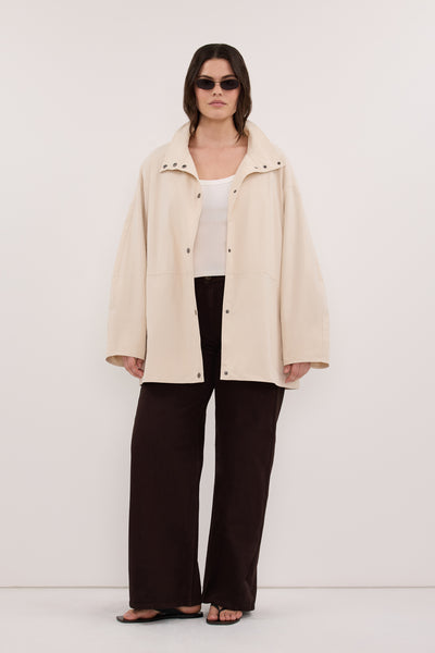 Jasmine wearing MARIS OYSTER MID LENGTH JACKET