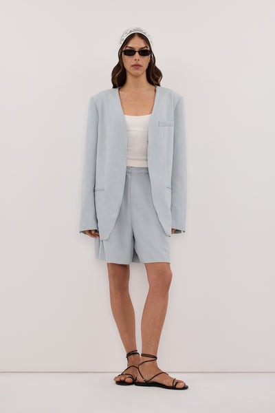 Helena  wearing HALINA MINERAL BLUE COLLARLESS BLAZER - PRE ORDER