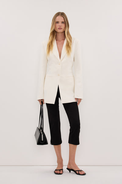Zoe wearing MILLIE CREAM CINCHED BLAZER