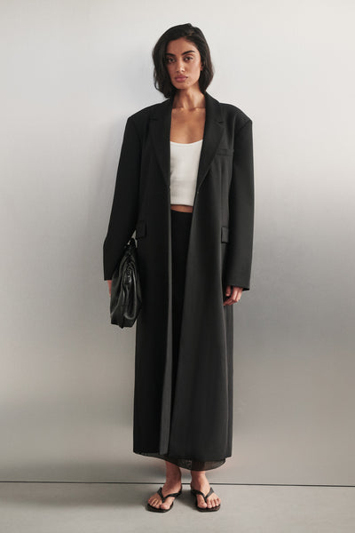 Anaya wearing VIDA BLACK LONGLINE BLAZER COAT