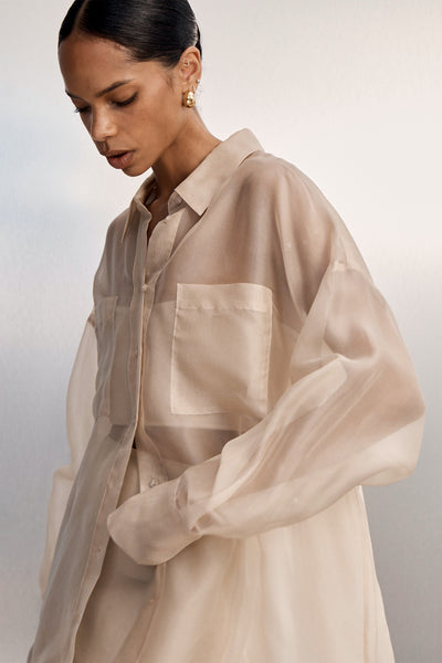 Kristen wearing SIAN GOLD SILK ORGANZA SHIRT