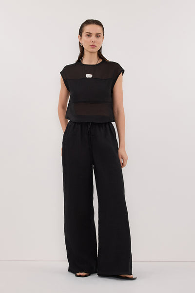 Stas wearing KAI BLACK RAMIE PANELLED TOP