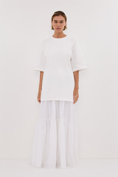 Joanna wearing NOAH WHITE LONGLINE TEE